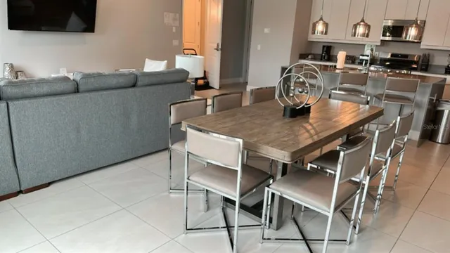 a view of a dining room with furniture