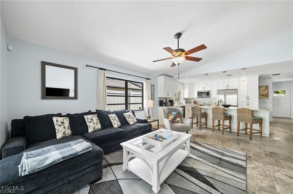 521 102nd Avenue North Naples, FL 34108 - Photo 15 of 25 a living room with furniture