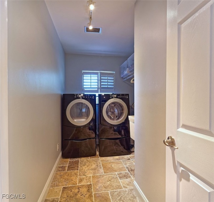521 102nd Avenue North Naples, FL 34108 - Photo 25 of 25 a bathroom with a sink and a mirror