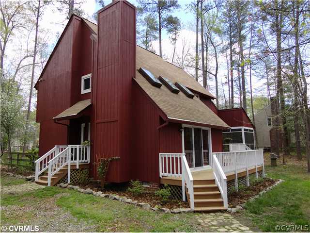 6310 Glebe Point Road Chesterfield, VA 23838 - Photo 2 of 12 front view of a house with a yard