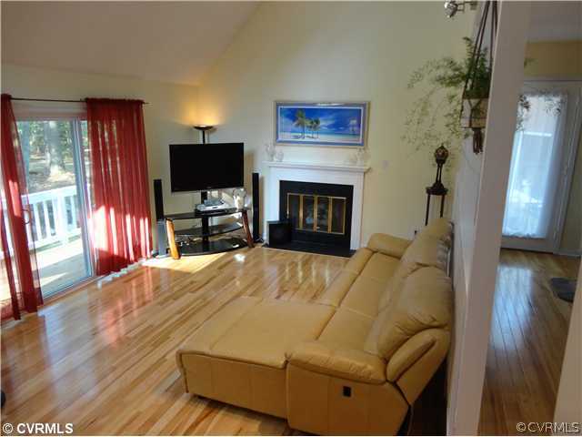 6310 Glebe Point Road Chesterfield, VA 23838 - Photo 6 of 12 a living room with furniture and a flat screen tv