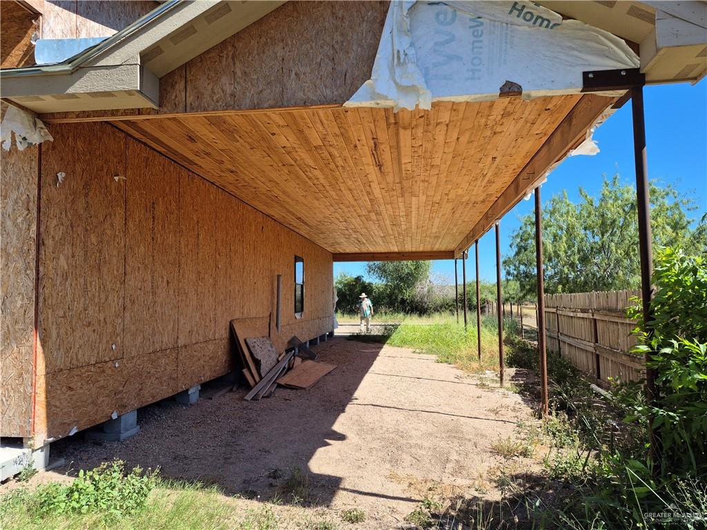 8618 North Gwin Road Edinburg, TX 78542 - Photo 2 of 7 a backyard of a house with garden and patio