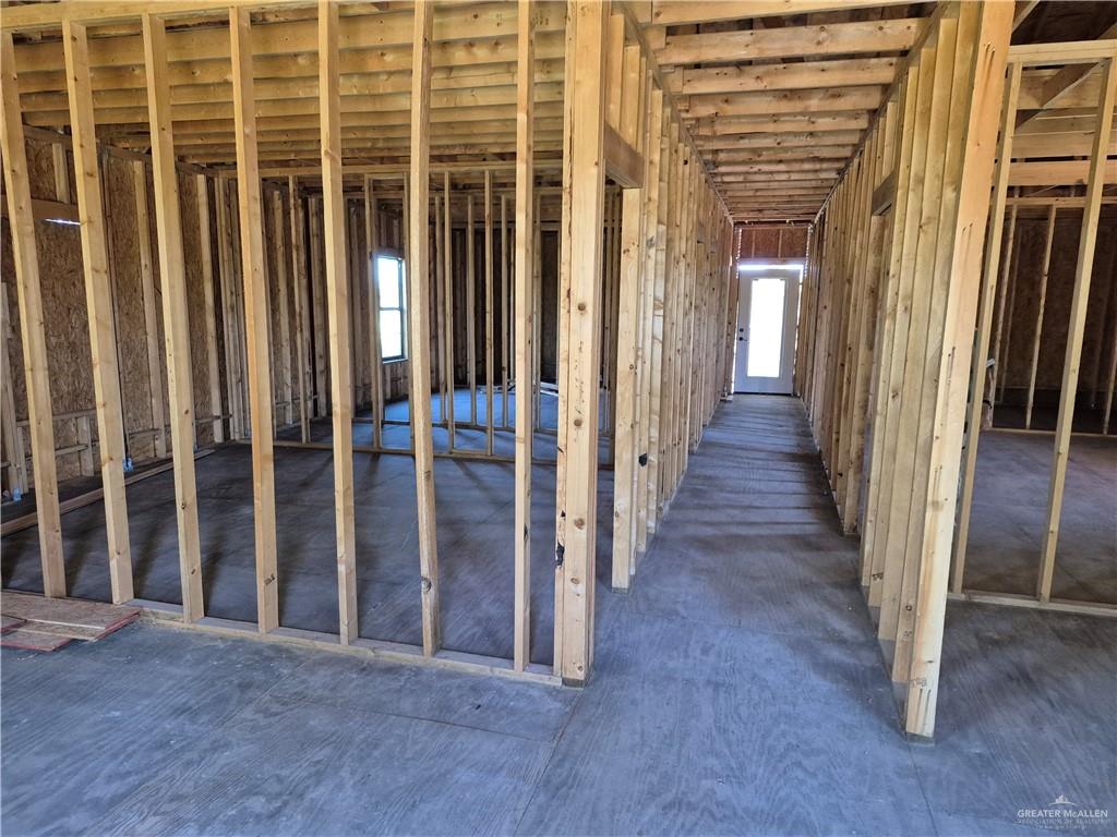 8618 North Gwin Road Edinburg, TX 78542 - Photo 5 of 7 a view of a porch with wooden floor and stairs
