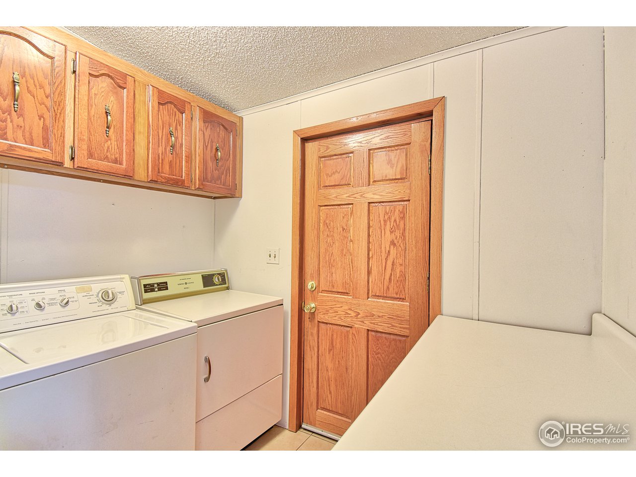 5510 Vallejo Street Denver, CO 80221 - Photo 16 of 22 a view of a kitchen with electric appliances