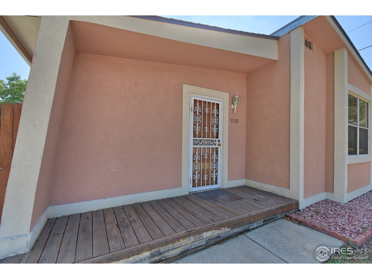 5510 Vallejo Street Denver, CO 80221 - Photo 2 of 22 a view of wooden floor and windows in a room