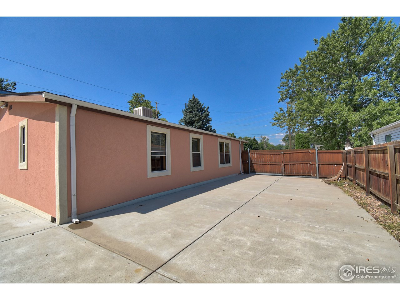 5510 Vallejo Street Denver, CO 80221 - Photo 21 of 22 a view of a house with a outdoor space