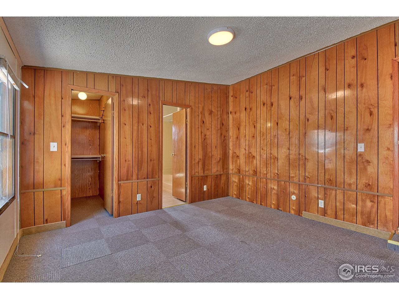 5510 Vallejo Street Denver, CO 80221 - Photo 8 of 22 a view of an empty room with a window