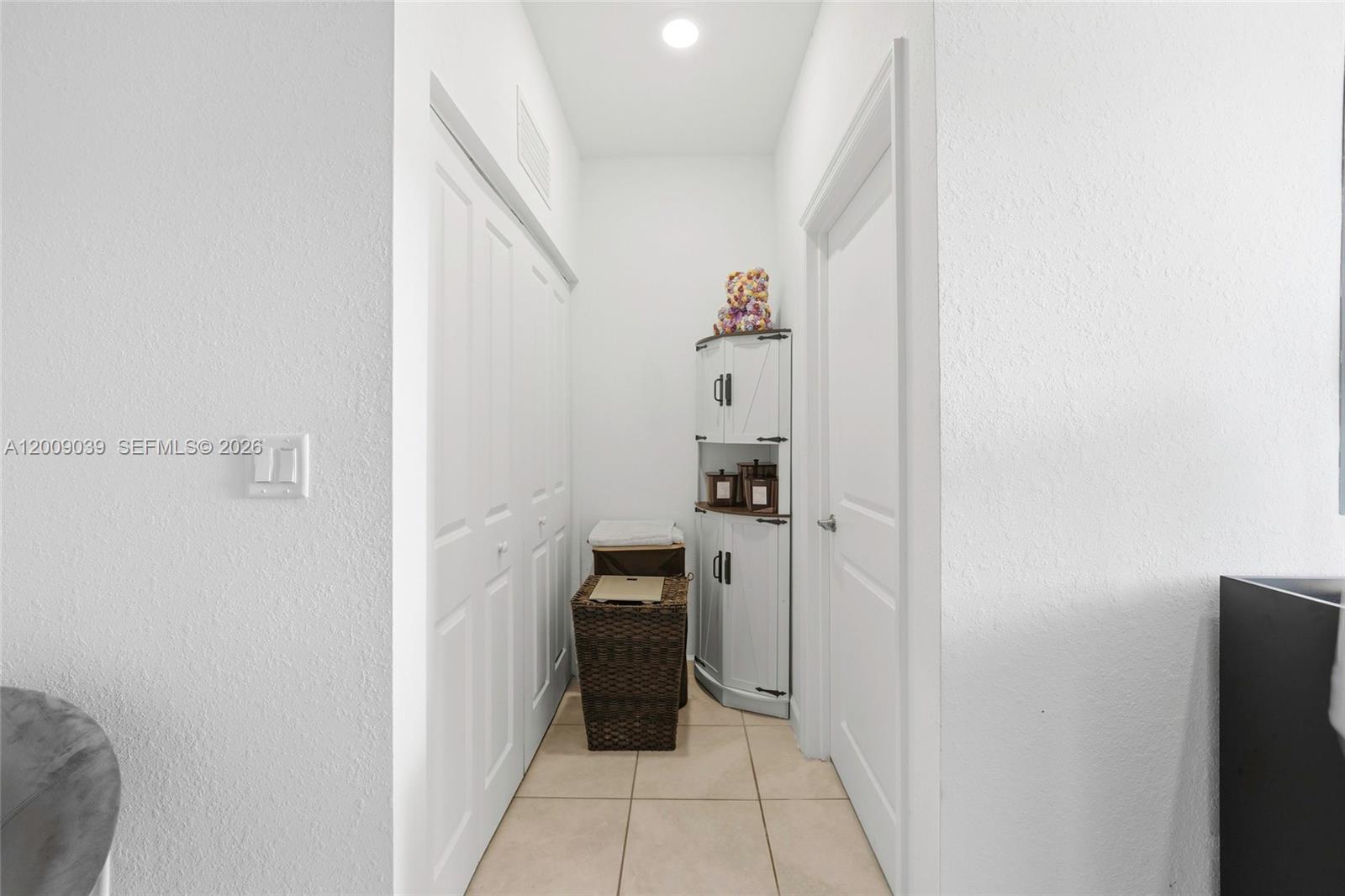 24644 Southwest 118 Court Homestead, FL 33032 - Photo 15 of 33 a kitchen with a refrigerator and a stove