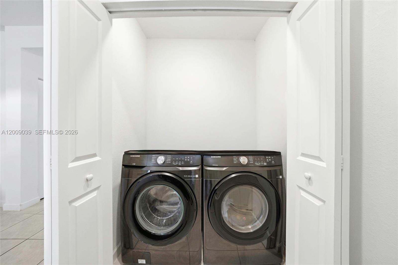 24644 Southwest 118 Court Homestead, FL 33032 - Photo 16 of 33 a utility room with dryer and washer