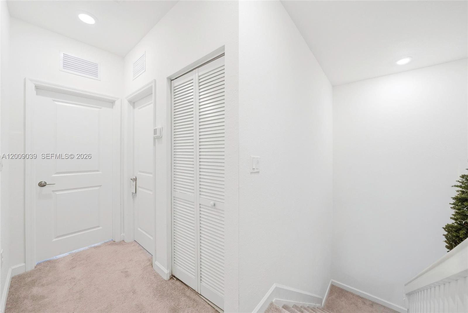 24644 Southwest 118 Court Homestead, FL 33032 - Photo 18 of 33 a view of hallway with closet