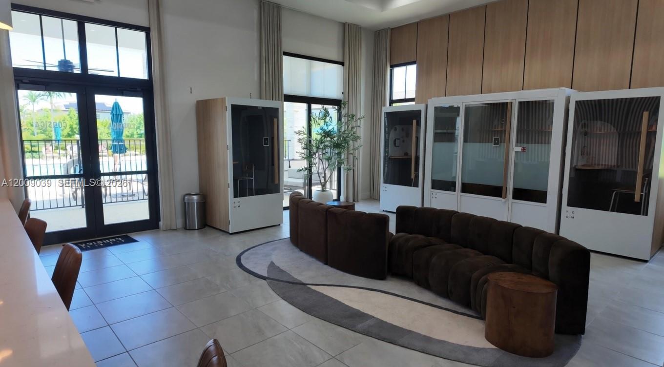 24644 Southwest 118 Court Homestead, FL 33032 - Photo 31 of 33 a living room with furniture and large windows