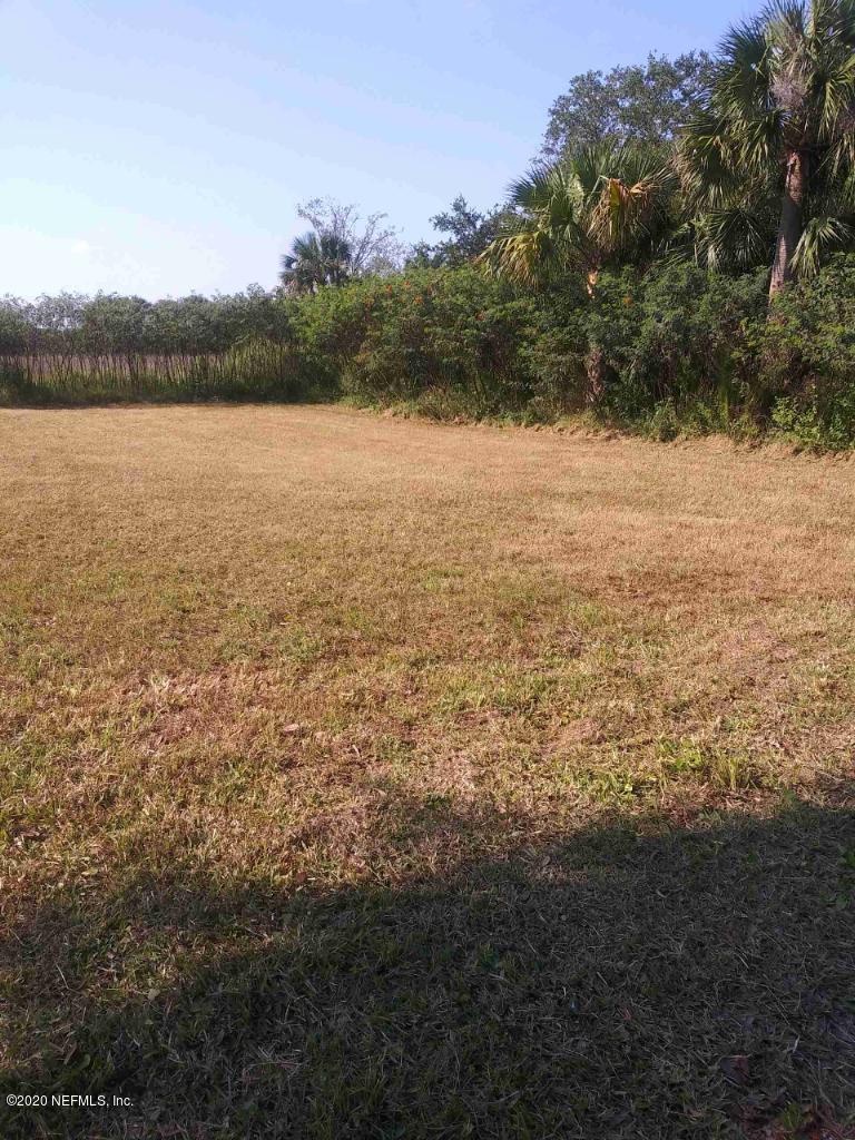 4503 Ribault Park Street Jacksonville, FL 32233 - Photo 3 of 3 Perry lot mowed