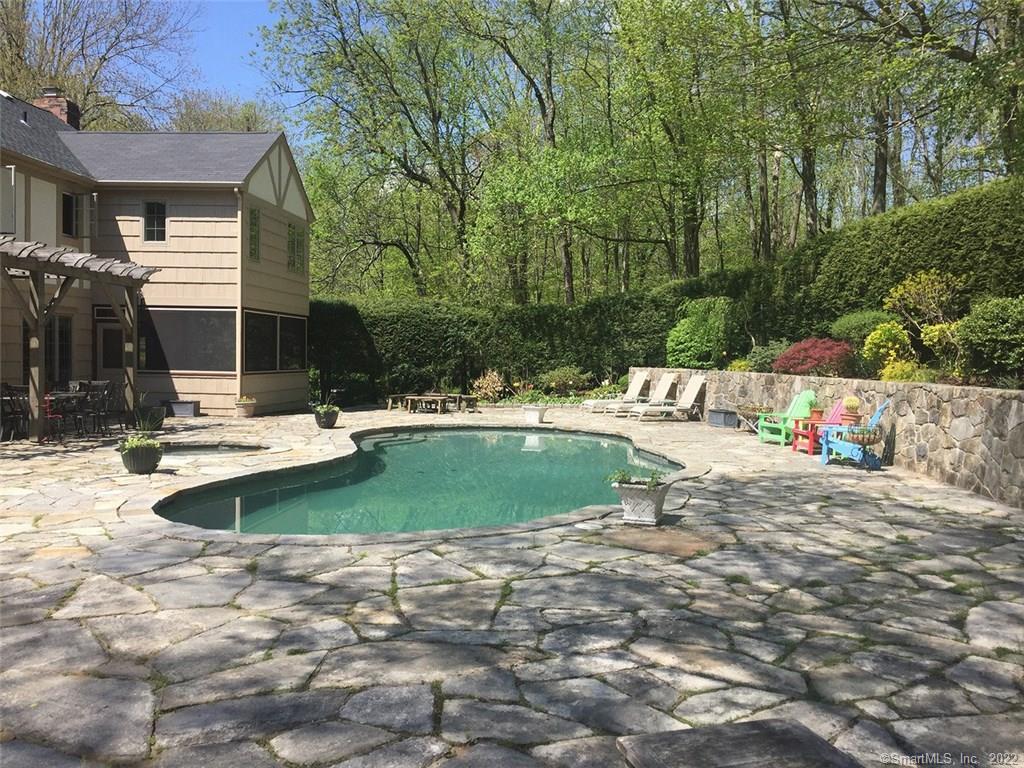 32 Hull Place Ridgefield, CT 06877 - Photo 1 of 1 a view of a swimming pool with a patio