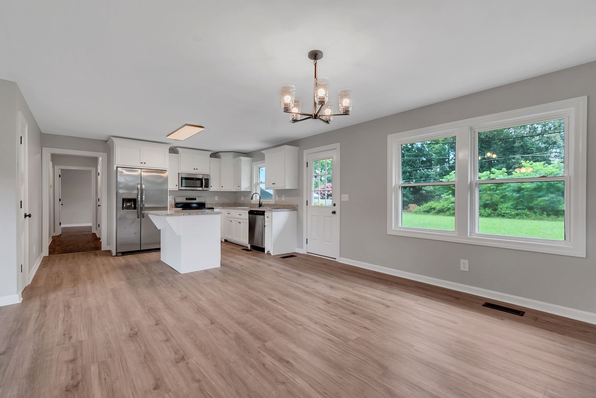107 Horseshoe Bend Road Leoma, TN 38468 - Photo 13 of 35 a view of a kitchen with granite countertop stainless steel appliances and window