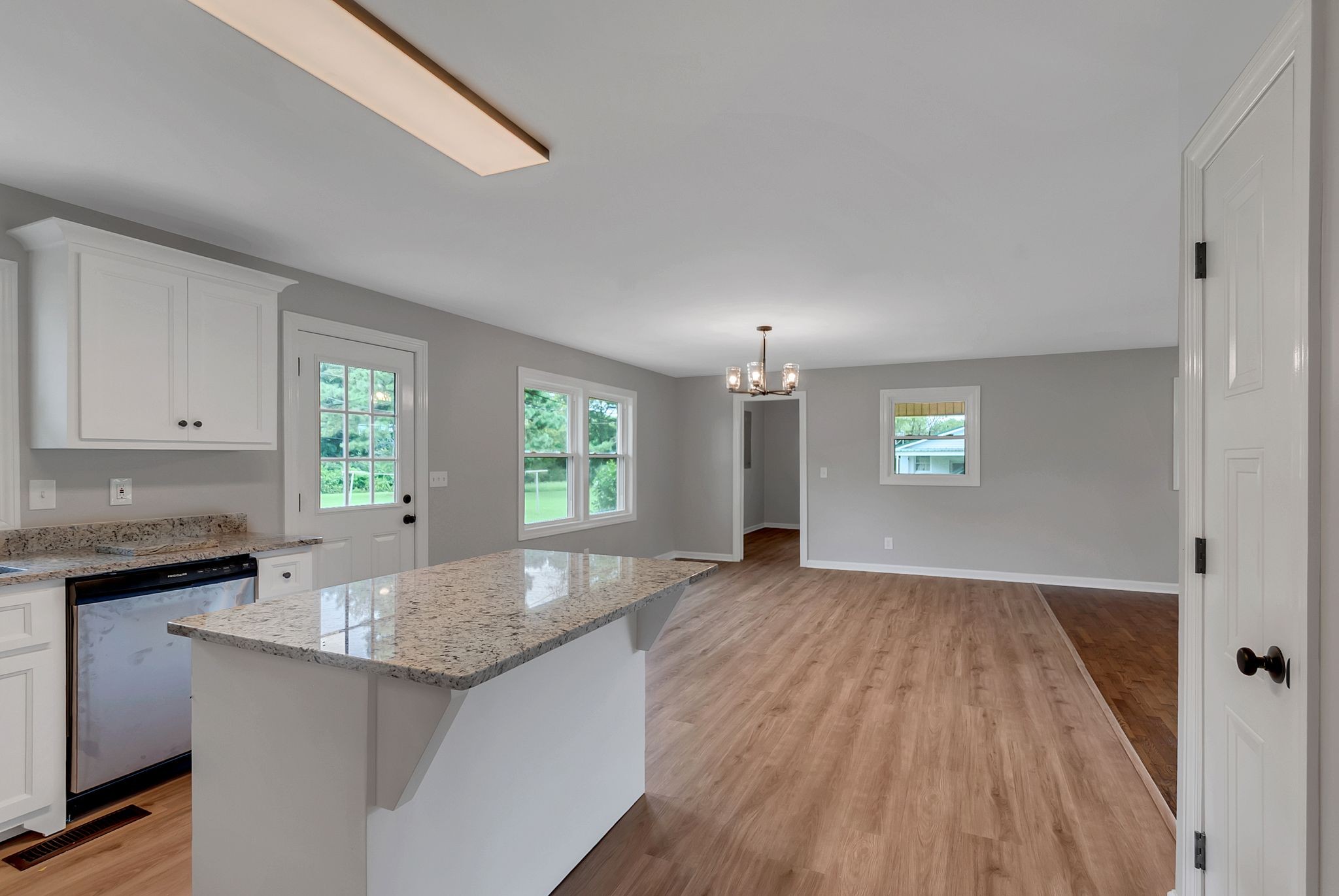 107 Horseshoe Bend Road Leoma, TN 38468 - Photo 19 of 35 a view of kitchen and hall with wooden floor