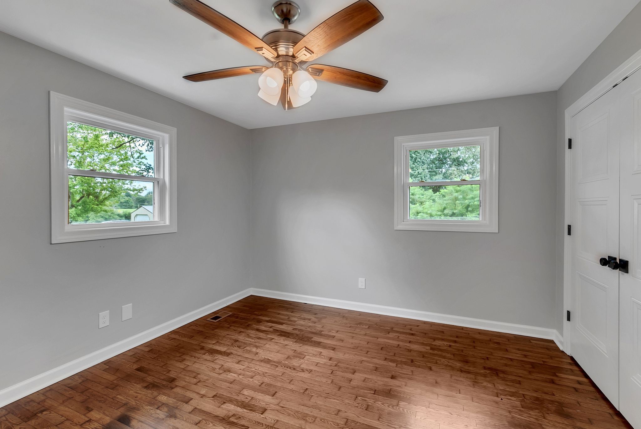 107 Horseshoe Bend Road Leoma, TN 38468 - Photo 23 of 35 wooden floor in an empty room with a window