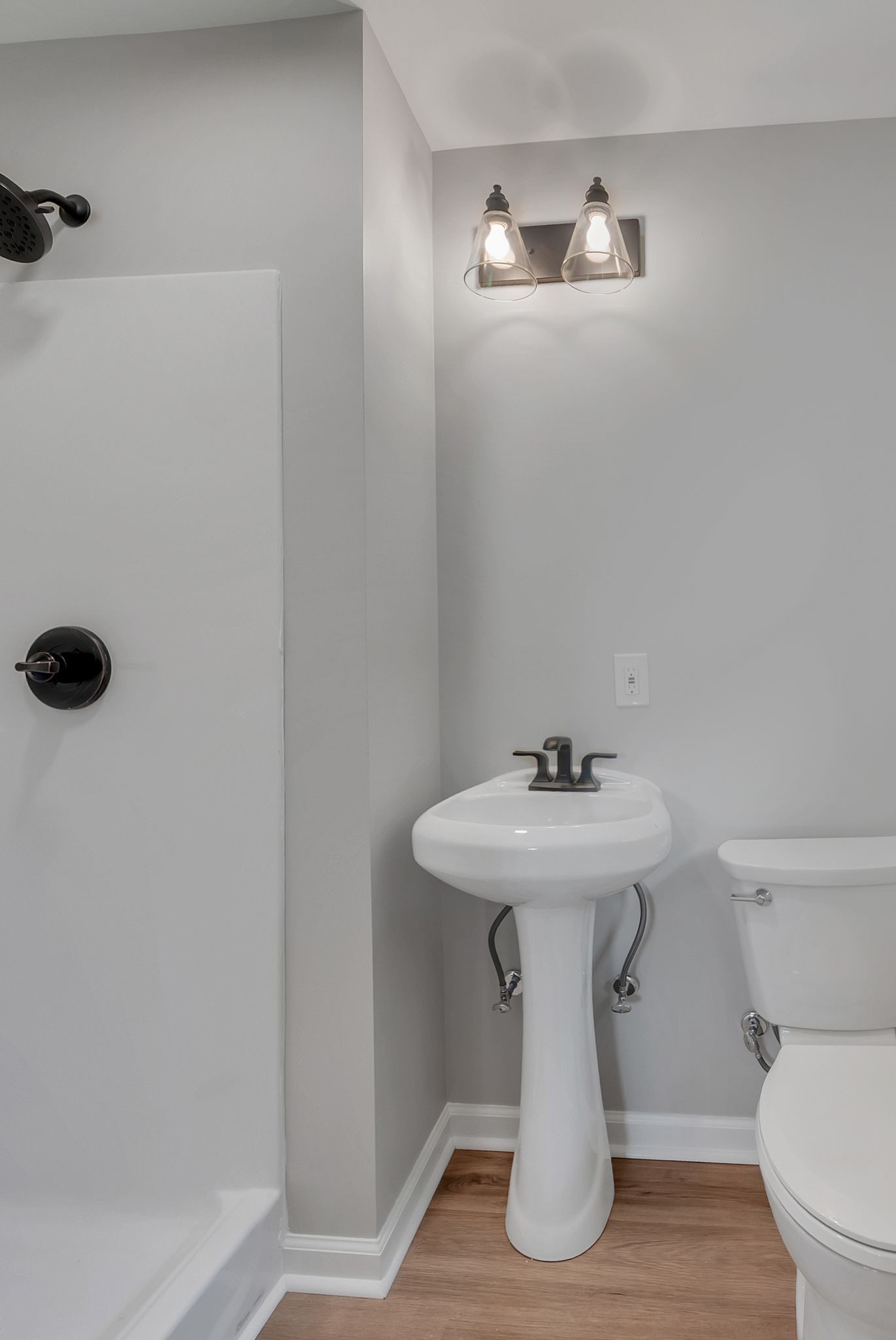 107 Horseshoe Bend Road Leoma, TN 38468 - Photo 29 of 35 a bathroom with a sink a toilet and mirror