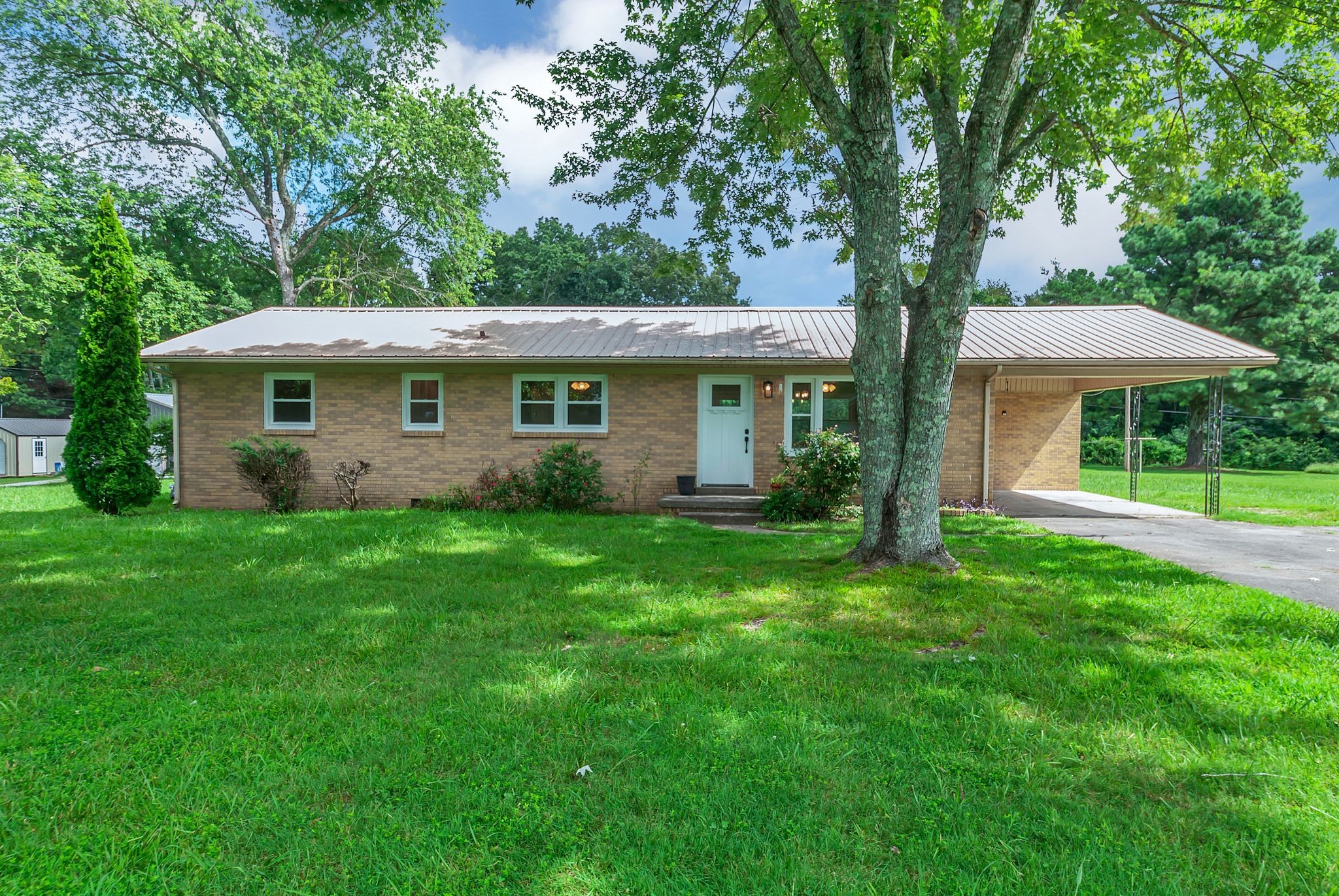 107 Horseshoe Bend Road Leoma, TN 38468 - Photo 3 of 35 a view of a house with a yard