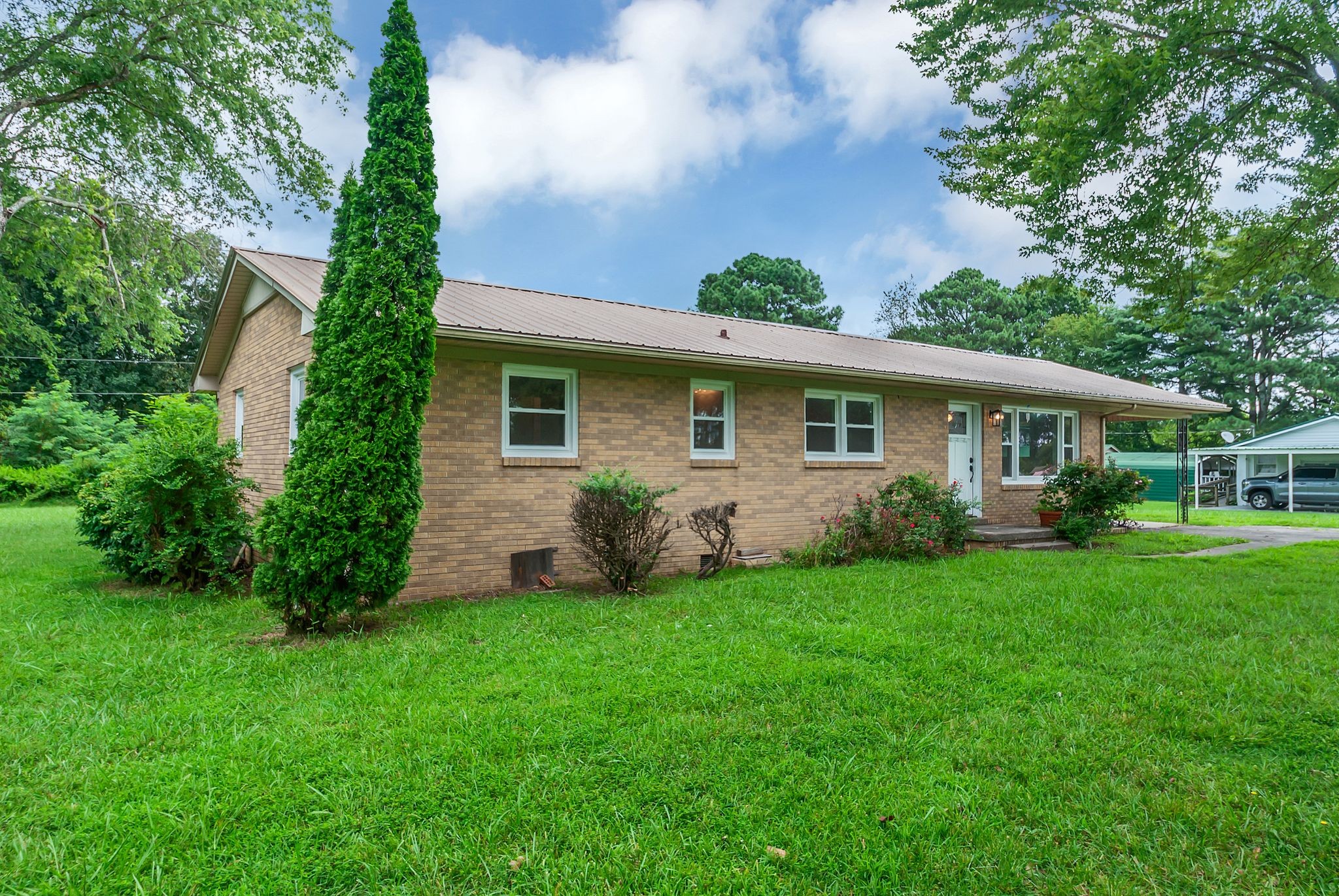 107 Horseshoe Bend Road Leoma, TN 38468 - Photo 5 of 35 a front view of house with yard and green space