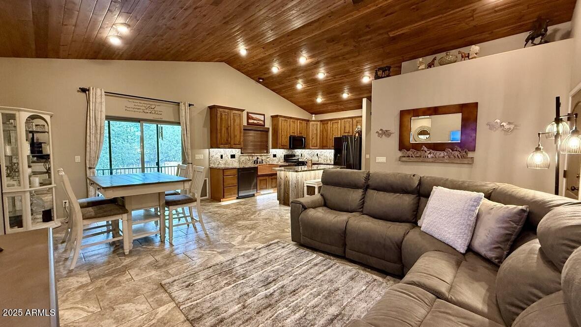 913 South Coronado Way Payson, AZ 85541 - Photo 11 of 52 a living room with furniture and a flat screen tv