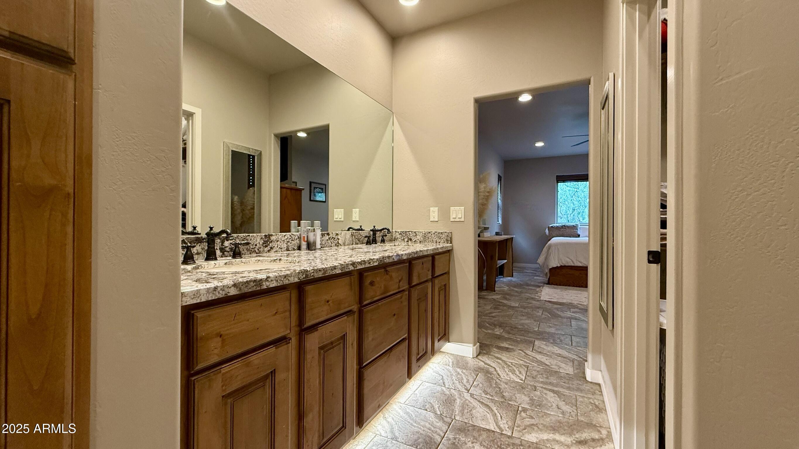 913 South Coronado Way Payson, AZ 85541 - Photo 19 of 52 a bathroom with a sink and a mirror