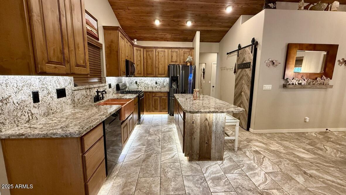 913 South Coronado Way Payson, AZ 85541 - Photo 2 of 52 a bathroom with a granite countertop sink a mirror and shower