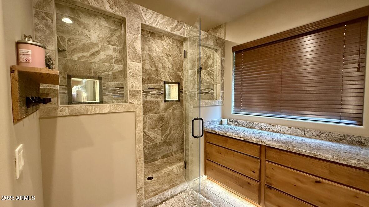 913 South Coronado Way Payson, AZ 85541 - Photo 21 of 52 a bathroom with a granite countertop sink and a mirror