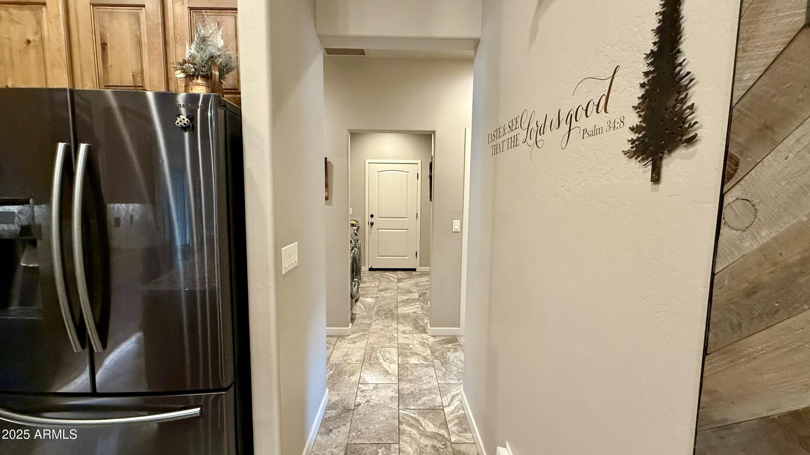 913 South Coronado Way Payson, AZ 85541 - Photo 26 of 52 a view of a kitchen with a refrigerator