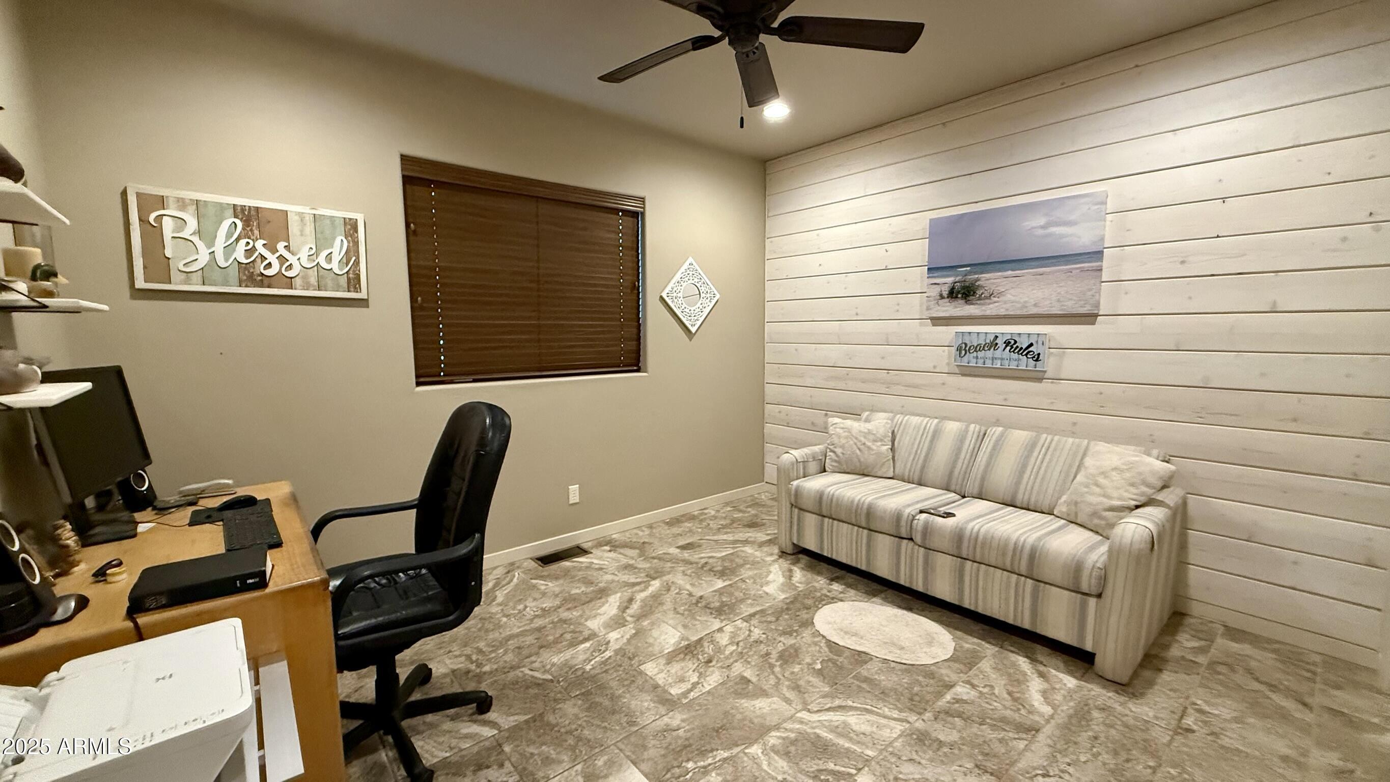 913 South Coronado Way Payson, AZ 85541 - Photo 30 of 52 a living room with furniture and a flat screen tv
