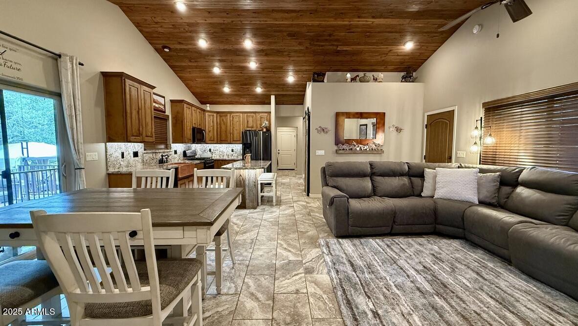 913 South Coronado Way Payson, AZ 85541 - Photo 5 of 52 a living room with furniture and a large window