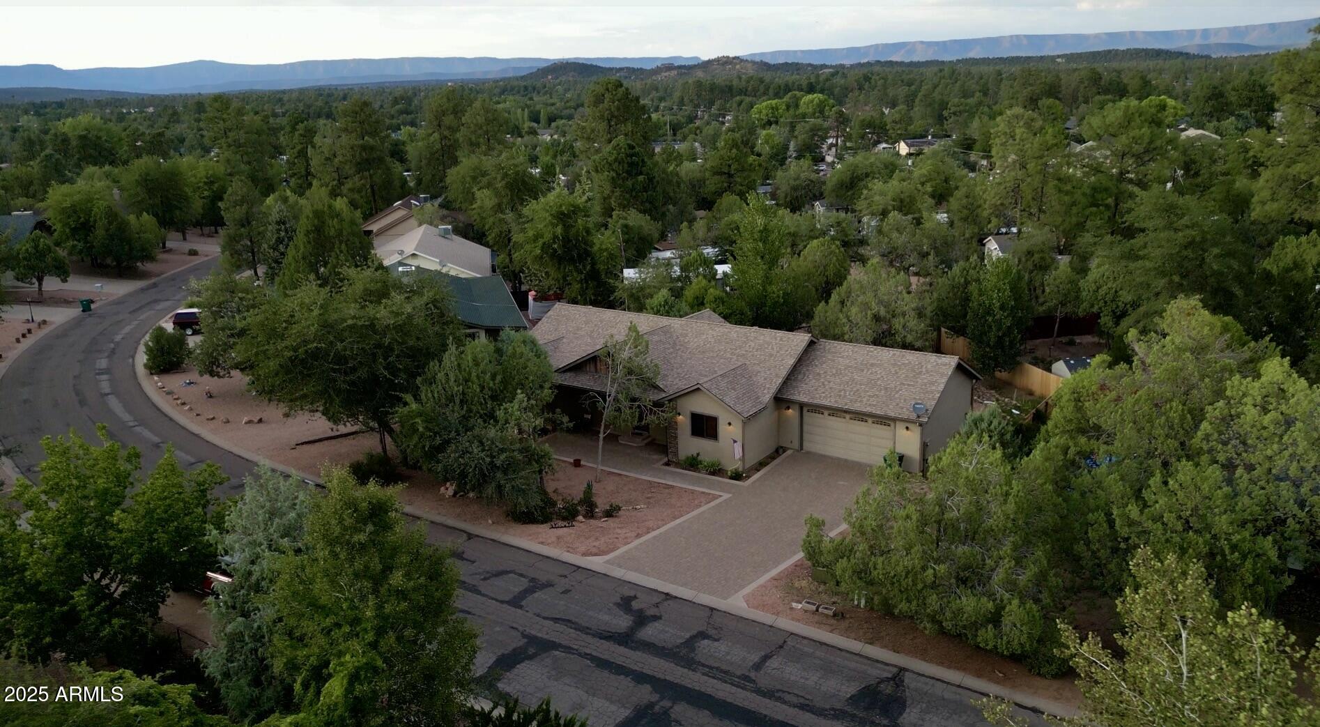 913 South Coronado Way Payson, AZ 85541 - Photo 52 of 52 an aerial view of a house with a yard