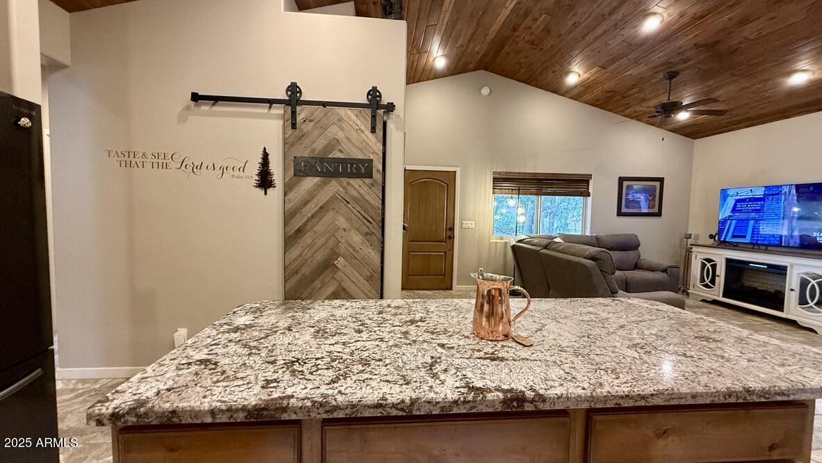 913 South Coronado Way Payson, AZ 85541 - Photo 7 of 52 a bed room with a bed and a television