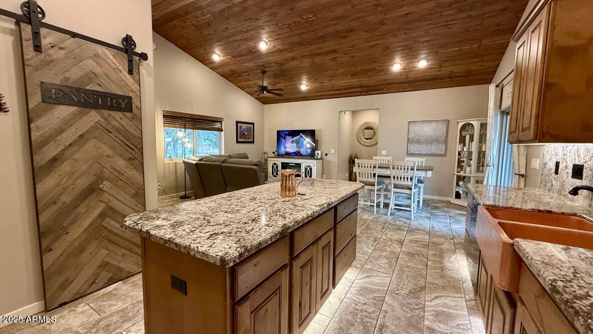 913 South Coronado Way Payson, AZ 85541 - Photo 8 of 52 a living room with stainless steel appliances granite countertop furniture and a kitchen view
