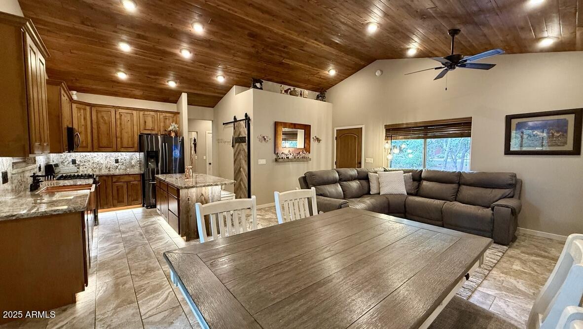 913 South Coronado Way Payson, AZ 85541 - Photo 10 of 52 a living room with furniture and a large window