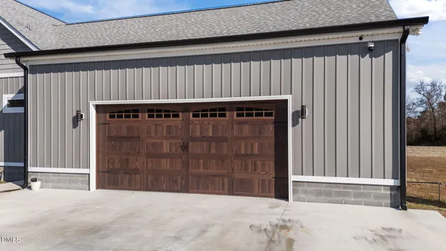 a house view with a garden space
