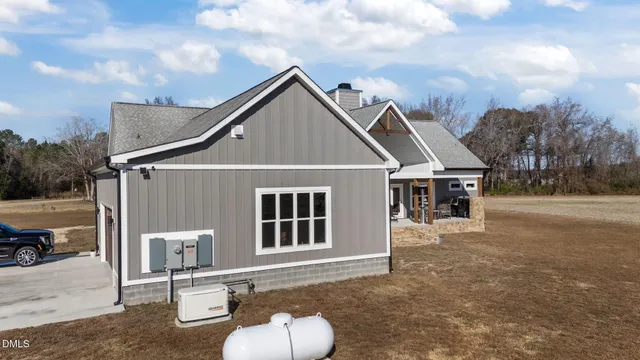 a view of a entryway with a table and chairs