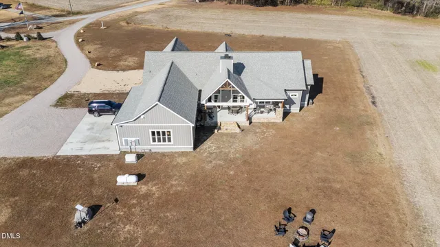 a view of swimming pool with a yard