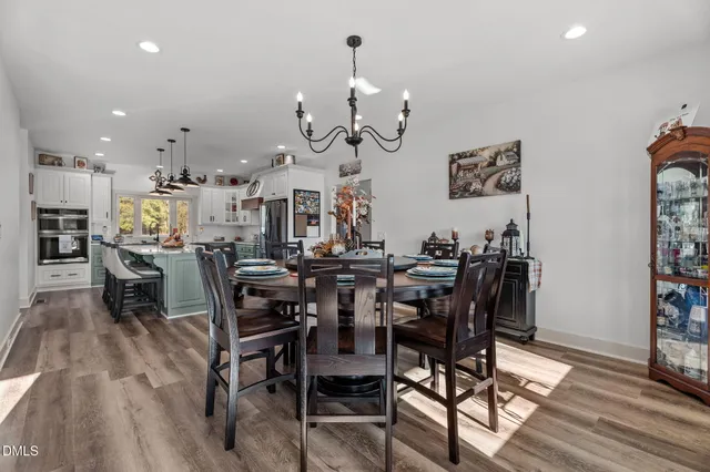 a bathroom with a granite countertop toilet sink and a mirror