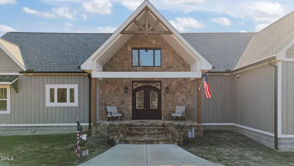 a front view of a house with yard