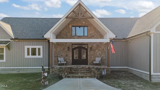 a front view of a house with yard