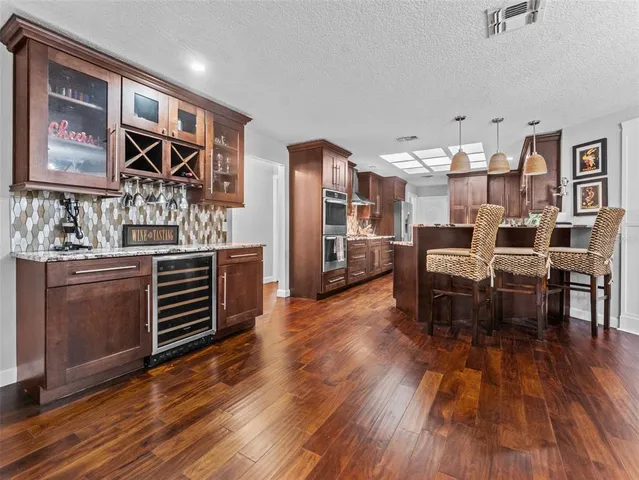 a bedroom with a bed and a view of bedroom