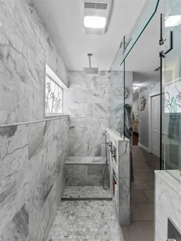 a bed room with a bed and dresser