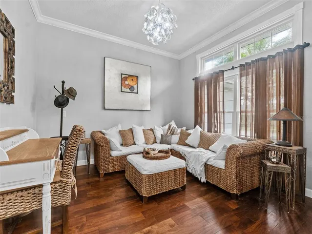 a utility room with dryer washer and wooden cabinets