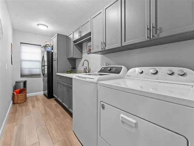 a view of a swimming pool with a patio