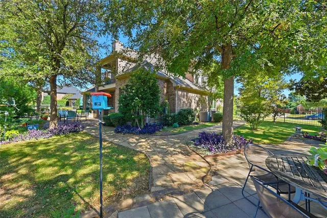 a front view of house with yard and outdoor seating