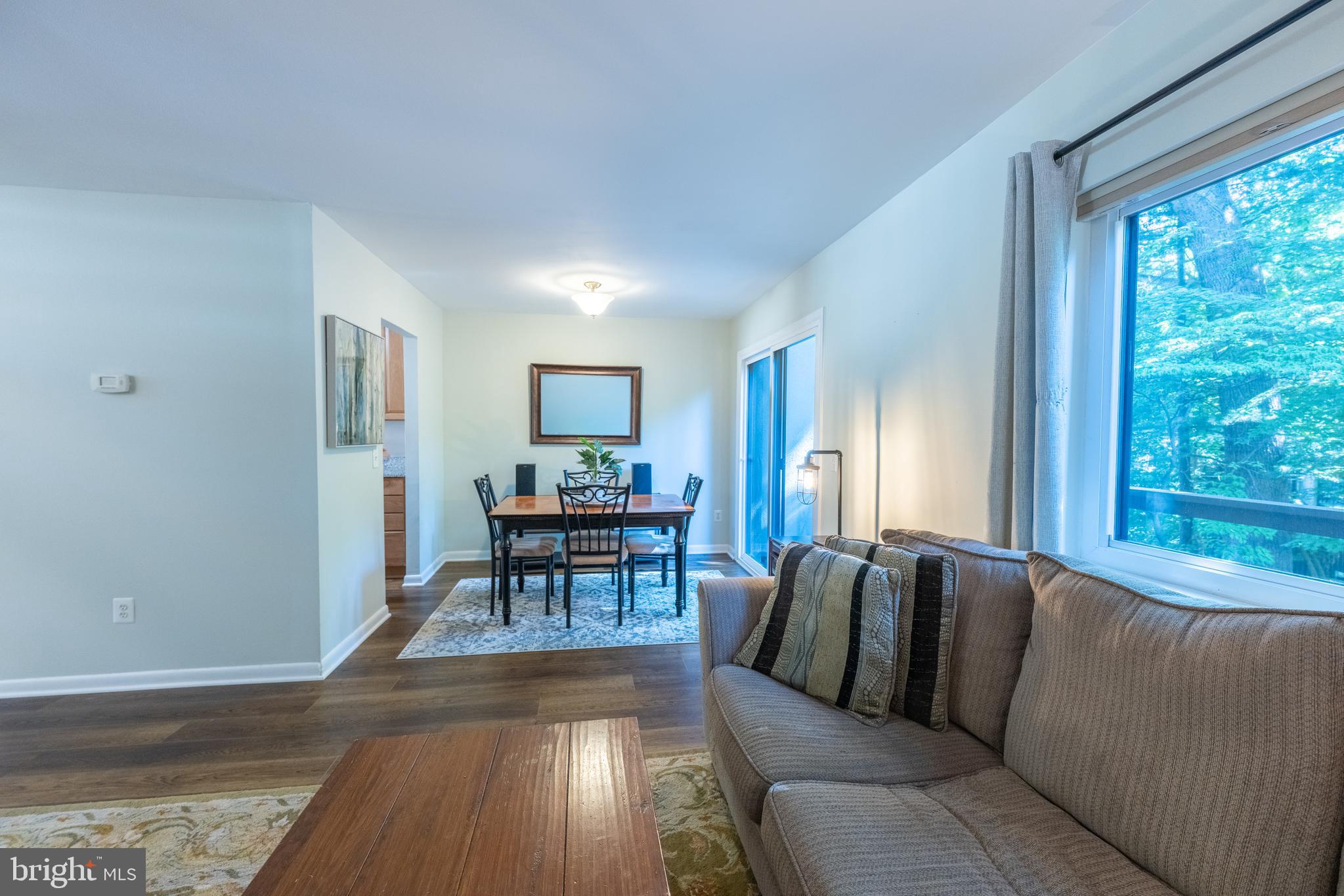 11917 Barrel Cooper Court Reston, VA 20191 - Photo 15 of 59 a living room with furniture and a fireplace