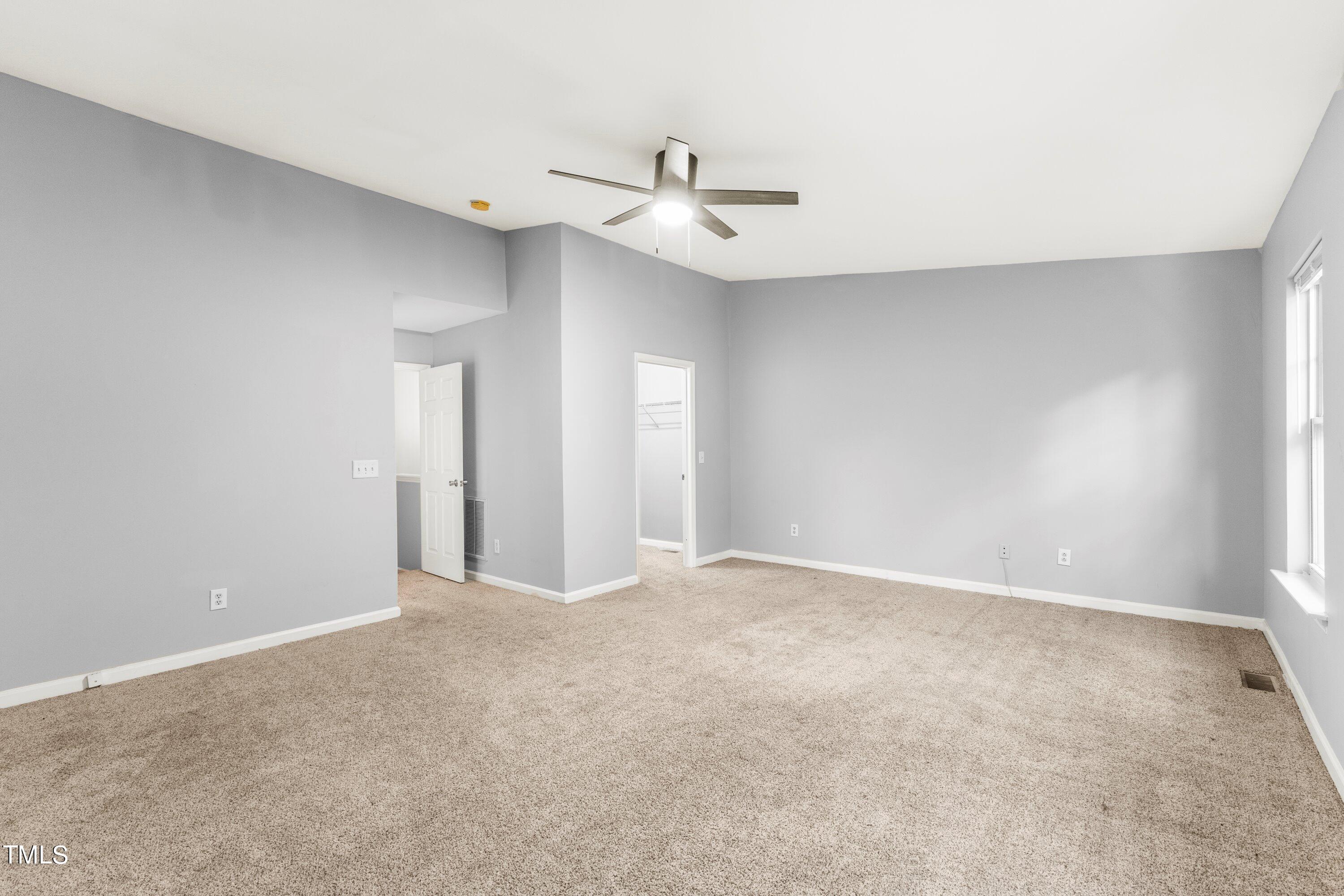 350 Gilman Lane, Unit 108 Raleigh, NC 27610 - Photo 26 of 34 a view of an empty room with a window