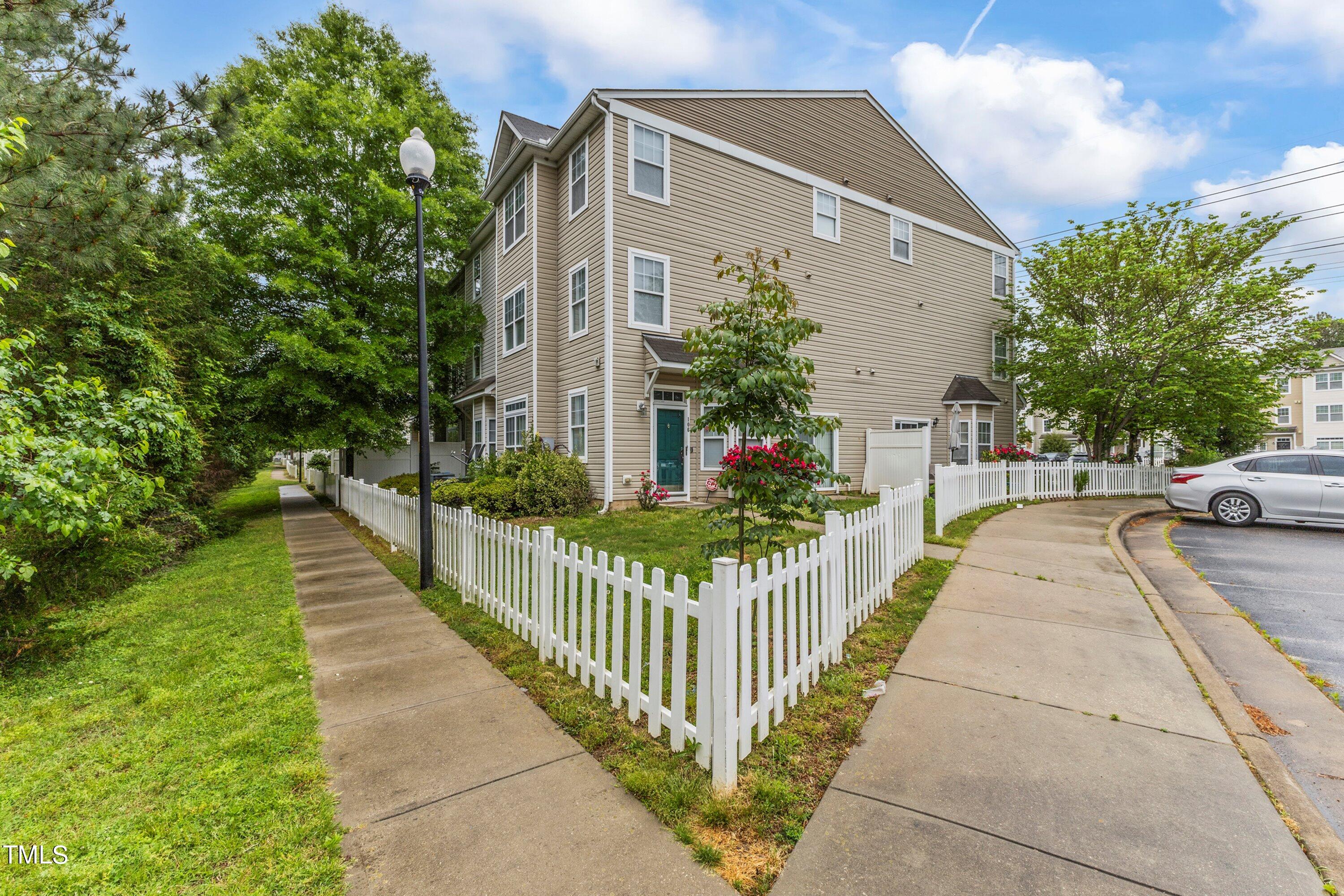 350 Gilman Lane, Unit 108 Raleigh, NC 27610 - Photo 32 of 34 a view of a house with backyard