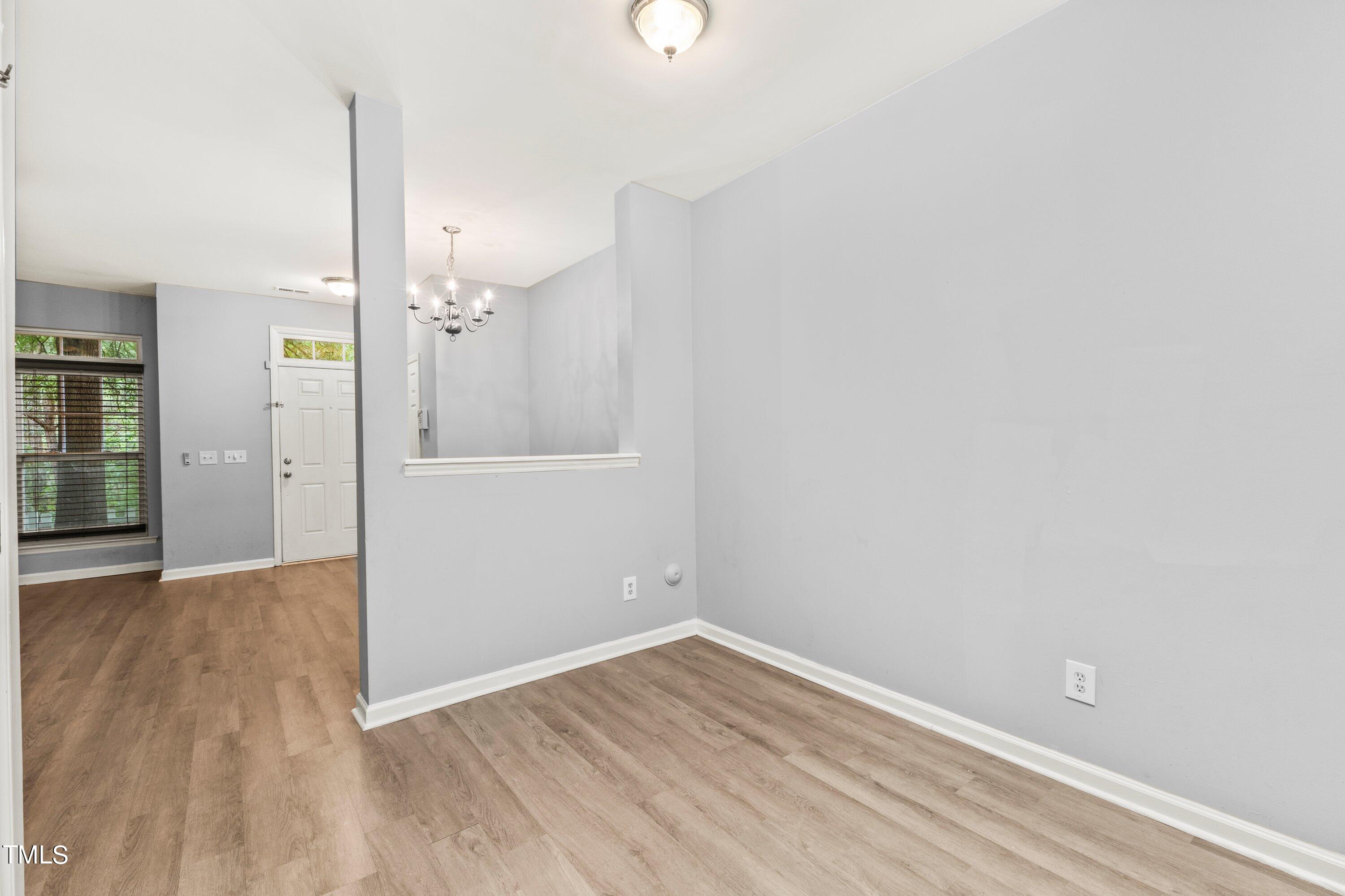350 Gilman Lane, Unit 108 Raleigh, NC 27610 - Photo 10 of 34 wooden floor in an empty room