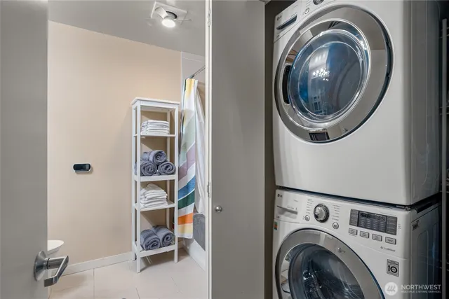 a view of a storage & utility room with washer and dryer